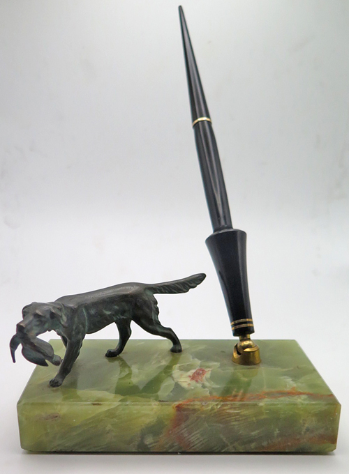 ITEM #6843 6803: PARKER MARBLE PEN BASE WITH BRONZE FIGURINE OF DOG RETRIEVING DUCK. Black pen holder with two brass bands and brass socket. Dimension of base is 5 1/2 x 3 1/2 x 3 inches. 